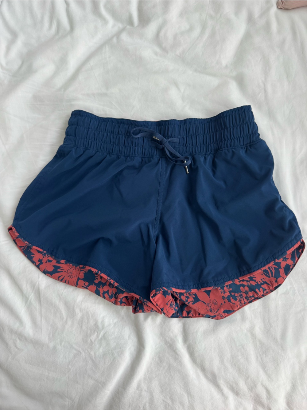 Lululemon reversible navy blue shorts with red floral print size 4